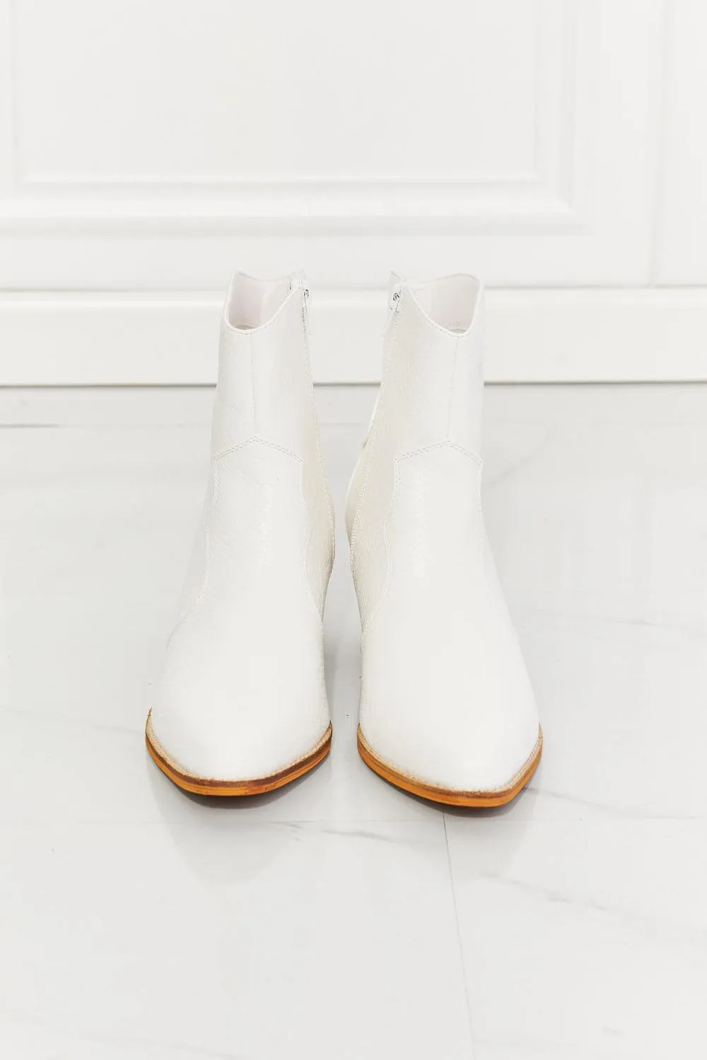 Hazel Blues® | Watertower Town Faux Leather Western Ankle Boots in White