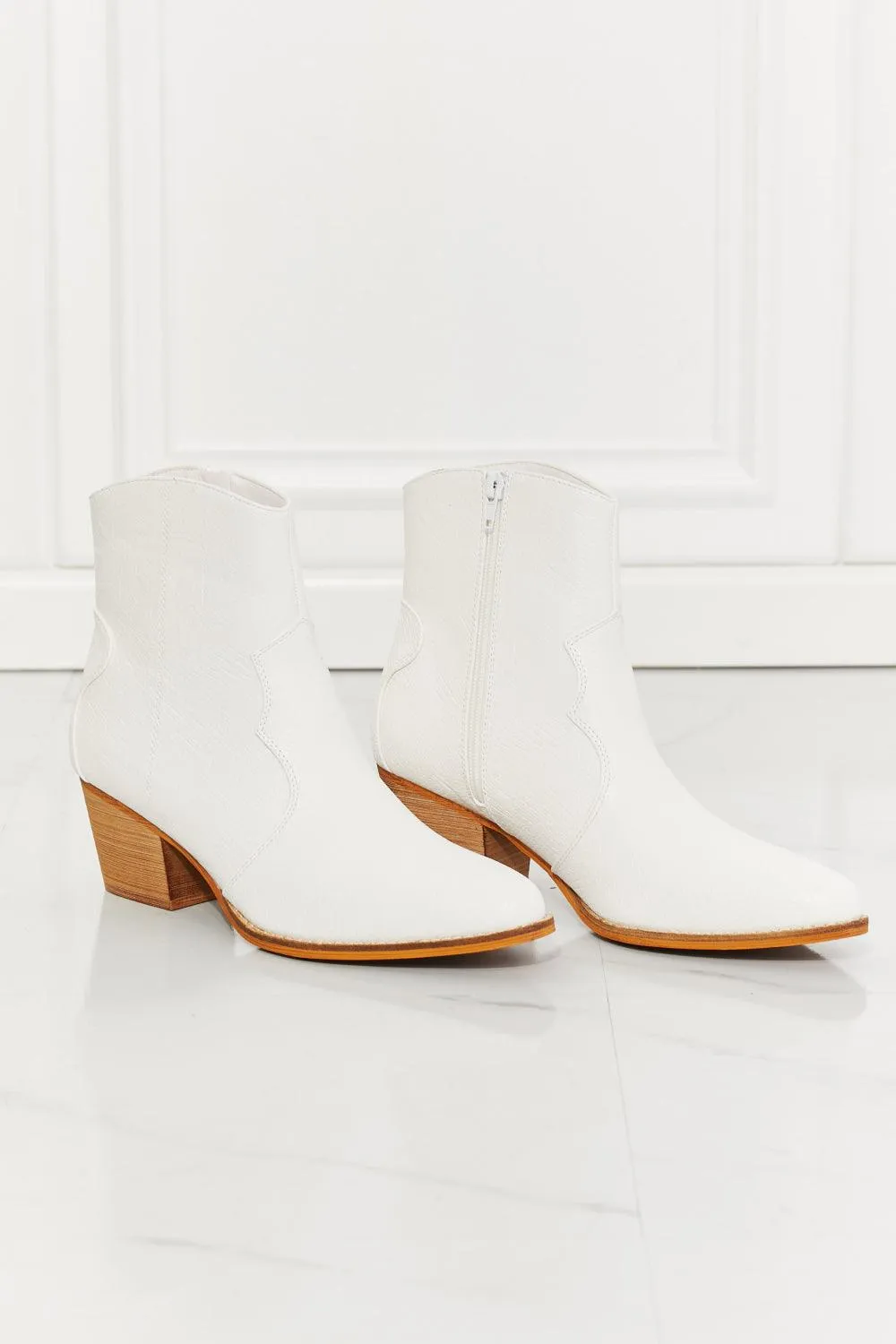 Hazel Blues® | Watertower Town Faux Leather Western Ankle Boots in White