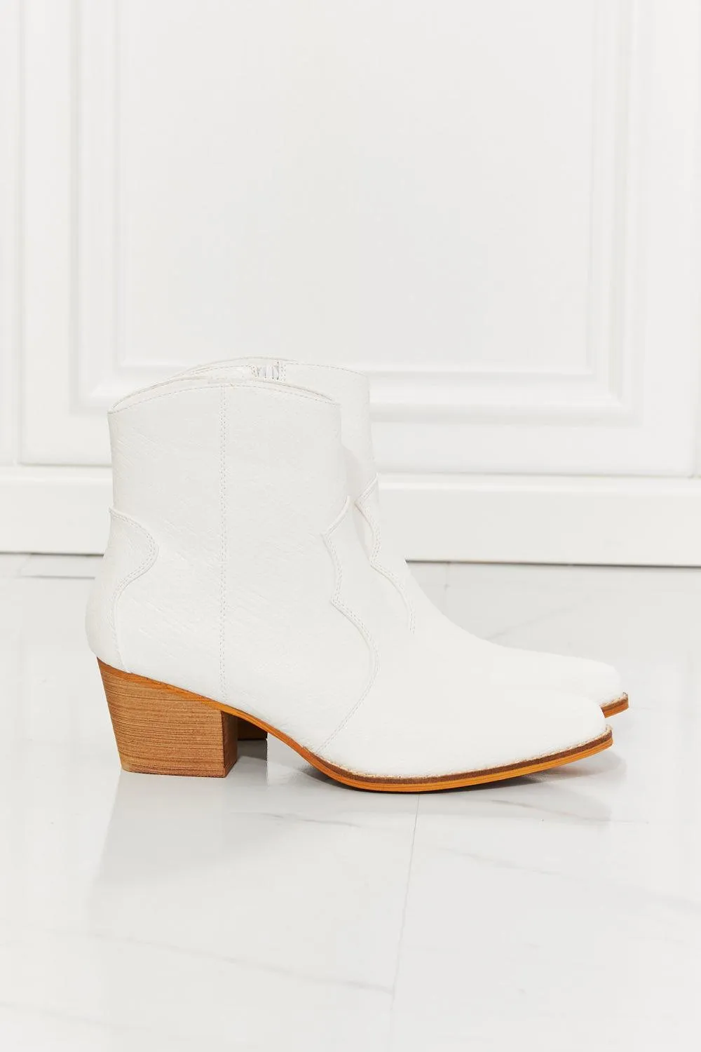 Hazel Blues® | Watertower Town Faux Leather Western Ankle Boots in White