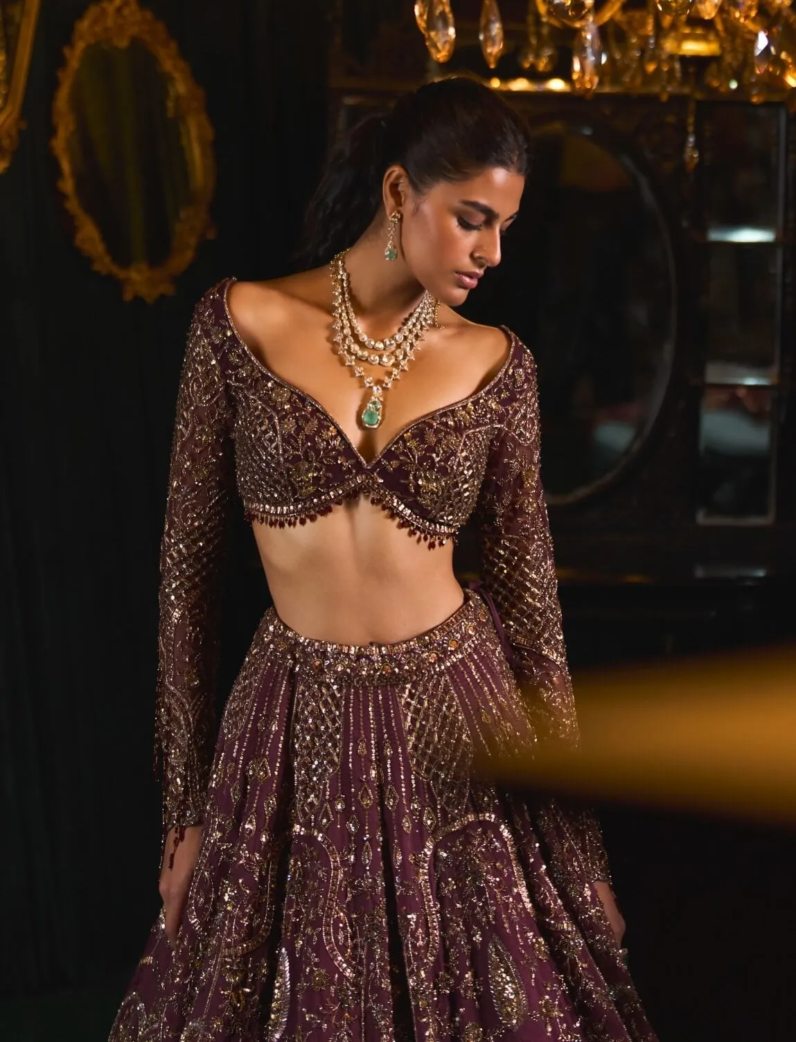 Mahruq wine gold zari lehenga set