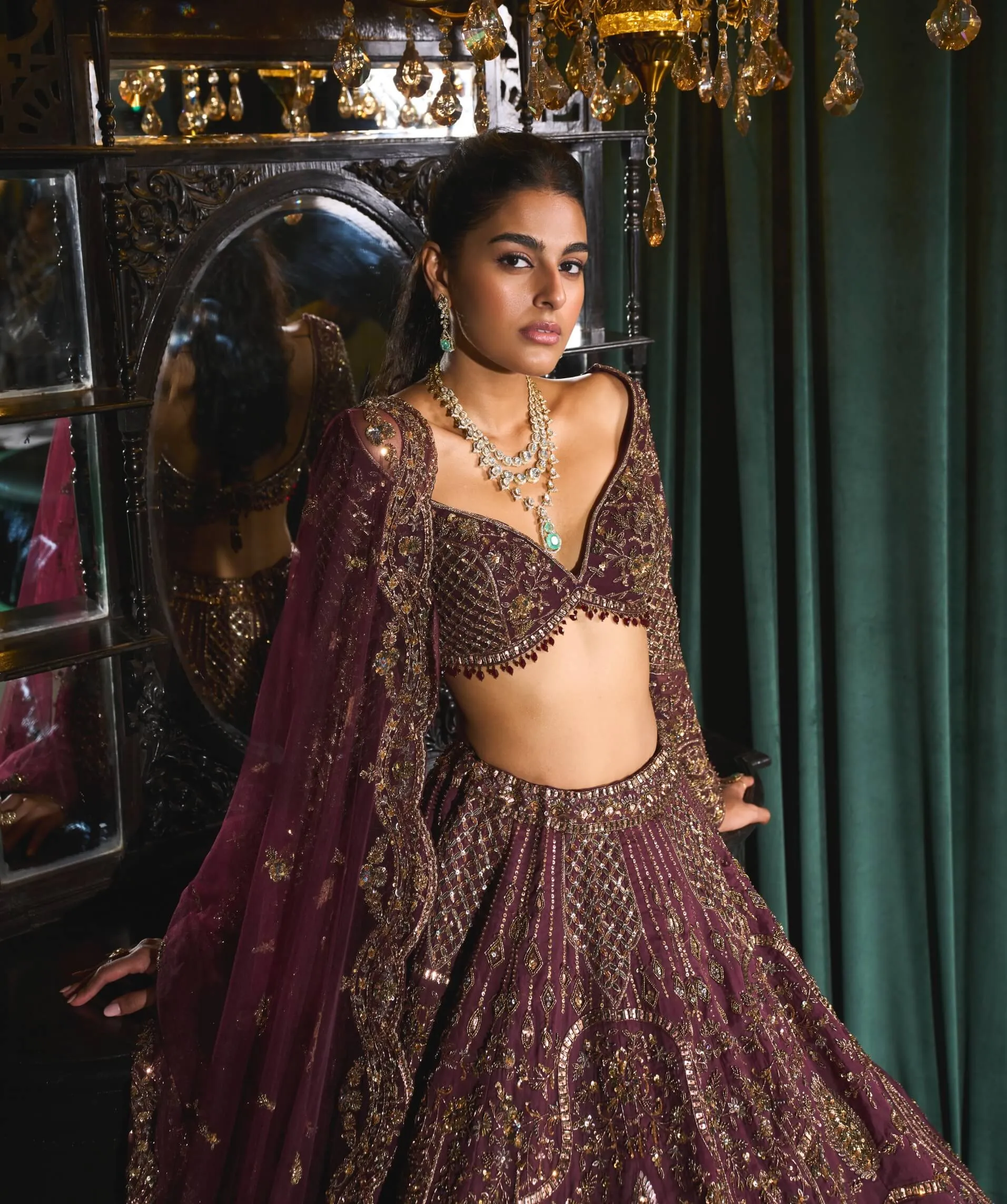 Mahruq wine gold zari lehenga set