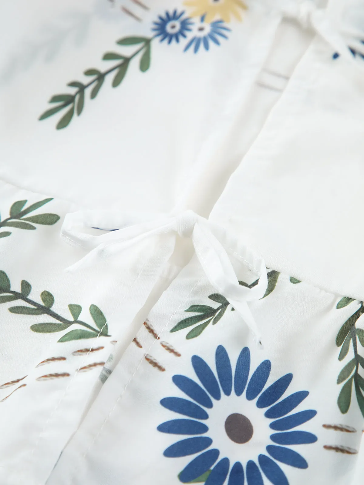 Semi-Sheer Tie Front Floral Blouse